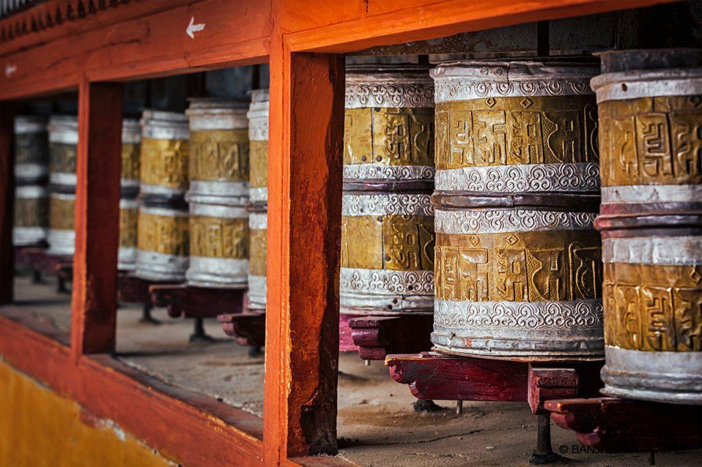 Prayer wheels at the base of Shanti Stupa