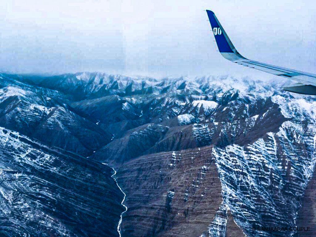 A frozen tributary of River Indus flowing through the valley from up in the air